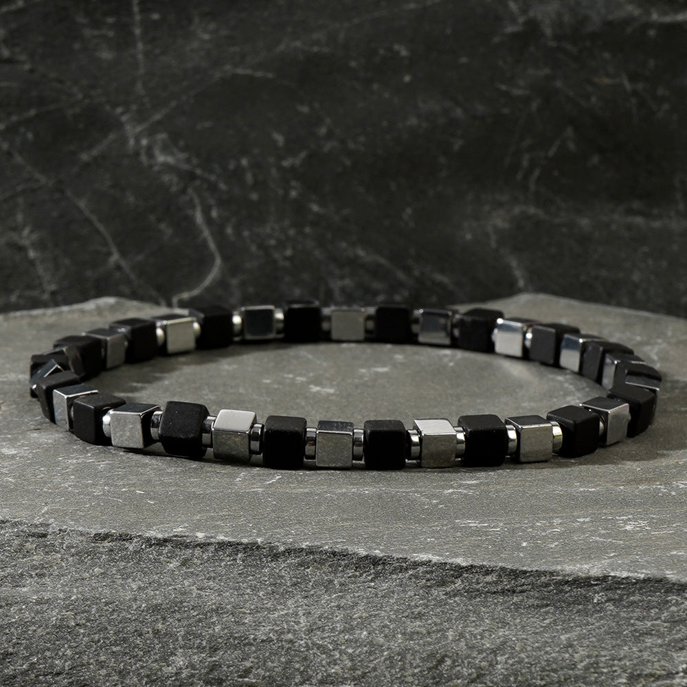 The cultural implications and symbolic significance of men wearing stone bracelets