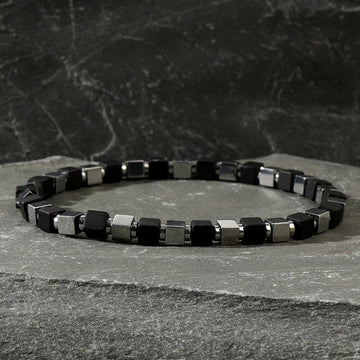 The cultural implications and symbolic significance of men wearing stone bracelets